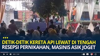 Detikdetik Kereta Api Lewat di Tengah Resepsi Pernikahan Masinis Asik Joget Ikutin Alunan Musik [upl. by Arutek]