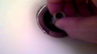 Pop up bathroom sink stopper with button  How To fix clean and assemble part 1 [upl. by Dragde]