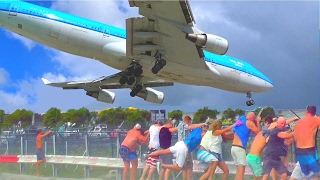 St Maarten unforgettable unique attraction KLM B747 low landing and amazing Jet Blast at Maho beach [upl. by Onitnelav]