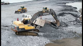 Incredible Dump truck driving backward to unload rocks gets stuck in the mudrecovered by Excavator [upl. by Ardnuaek955]