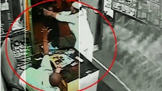 On CCTV Mumbai shopkeeper attacked with sword customer saved him [upl. by Cowley581]