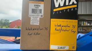 New Holland Workmaster 75 Change Fuel Filter amp Fuel  Water Separator [upl. by Eiramasil35]