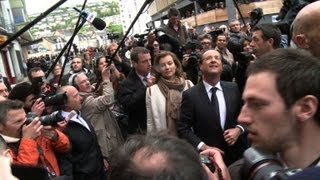 François Hollande fait la tournée des bureaux de vote de Tulle [upl. by Llieno575]