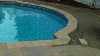 Bullnose coping and ribbon stone pool patio [upl. by Ecirehc]