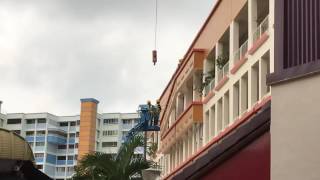 Workers securing the damaged structure at Tampines [upl. by Hinkel]