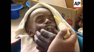 Malnourished children get help at feeding centre [upl. by Lesirg813]