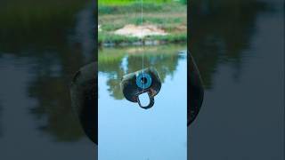 She used a magnet to pick up objects that fell into the water survivalskills outdoors lifehack [upl. by Adeys]