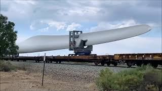 Huge Wind Turbine Blades being Transported West to Wind Farms by Custom Flat Train Railcars [upl. by Ganny345]