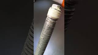 Securing the stainless steel bolt at the end of the screw with a pin [upl. by Nedrah]