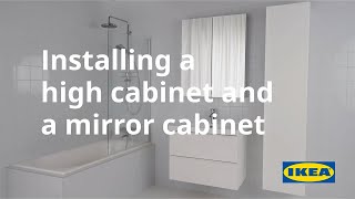 Installing a high cabinet and a mirror cabinet [upl. by Noraa]