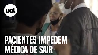 Pacientes de UPA no Rio se revoltam sem atendimento e tentam impedir saída de médica [upl. by Erastatus]