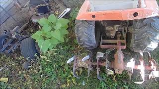 removing tiller and installing push blade on my Bolens tractor [upl. by Farrica]