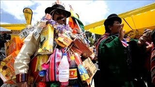 Indigenous Aymara in Bolivia celebrate Alasita festival [upl. by Rednasyl]