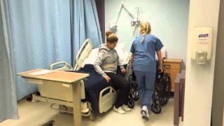 Transferring patient from bed to wheelchair [upl. by Gulgee]