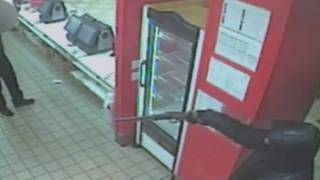 Armed robbery at McDonalds in north London captured on CCTV [upl. by Odnumde886]