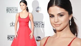 Selena Gomez Makes Red Carpet Return amp STUNS In Red Gown At 2016 AMAs [upl. by Riehl648]