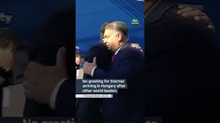 No handshake from Orbán in Hungary after Starmer arrives too late for a greeting [upl. by Darrelle]