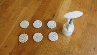 How to Change a Mooncake Cookie PressCake Mold [upl. by Ettenuj]