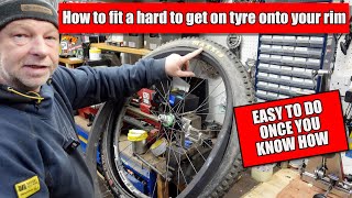 How to fit a really difficult fitting tyre to a Bike wheel [upl. by Jobina93]