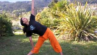 Trikonasana  Triangle Pose in Spanish [upl. by Eidnew280]