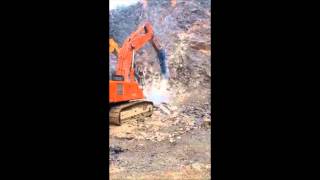 HYDRAULIC BREAKER  HAMMER HS 4500 IN CHINA IRONSTONE QUARRY [upl. by Twyla]