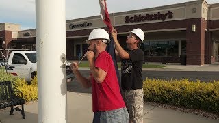 Lowering a Large Flag on a Winch Flagpole [upl. by Freddie]