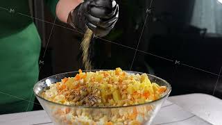 Chef adding freshly ground pepper to salad [upl. by Llertak]