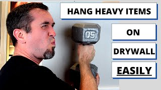 How to Hang Heavy Items on Drywall [upl. by Mcdougall]