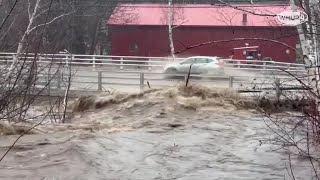 Water rages over bridge in Gorham New Hampshire [upl. by Gibrian]