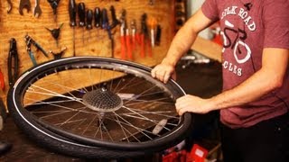 How to Put on New Bike Tire amp Tube  Bicycle Repair [upl. by Ahsieker]