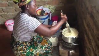 Farmer´s wife preparing Zambia´s typical maize meal nshima [upl. by Okiek]