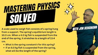 Mastering Physics Solved 826 A scale used to weigh fish consists of a spring hung from a support [upl. by Annehsat]