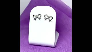 Sterling silver bow shaped stud earrings [upl. by Ojyllek]