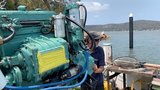 Craning the Detroit Diesel into the trawler [upl. by Ttelrats]