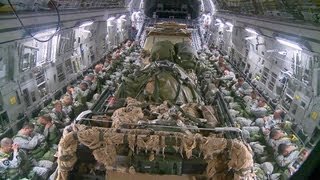 C17 Heavy and Personnel Drop Onto the Aircraft and Takeoff [upl. by Nuncia]