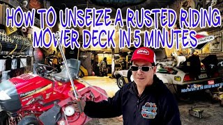 HOW TO UNSEIZE A RUSTED RIDING LAWN MOWER MOWING DECK IN 5 MINUTES WITH PB BLASTER amp A BREAKER BAR [upl. by Anicul977]