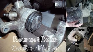 How to Retract Rear Caliper Piston [upl. by Ahsakal503]