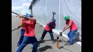 Four Men Hammering A Tent Peg [upl. by Zarihs]