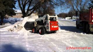 Bobcat S250 loading dump truck [upl. by Jueta789]