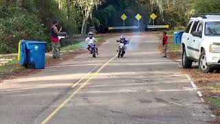 Jfresh built 50cc pit bike vs CousinChase stock syxmoto 50cc pit bike drag race 🏍🏍💨💨 [upl. by Naesed431]