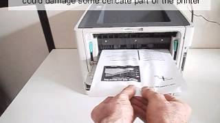 How to fix a printer paper jam [upl. by Neetsirk426]