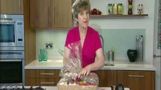 Wrapping a hamper using cellophane wrap [upl. by Latonia251]