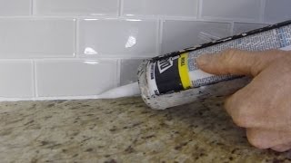 How To Install Caulk On A Kitchen Tile Backsplash [upl. by Brunhilde330]