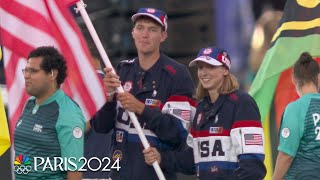 Katie Ledecky Nick Mead lead Team USA out for Closing Ceremony  Paris Olympics  NBC Sports [upl. by Amhser501]