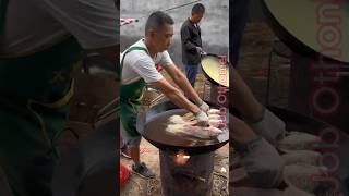 cook showing how to fry fish in a case with boiling oil in a rural area [upl. by Nerrot]