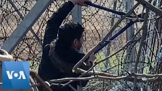 Migrants Attempt to Cut Through Fence at GreeceTurkey Border [upl. by Barny904]