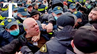 Georgia police in violent clash with protesters in Tbilisi [upl. by Oirottiv]