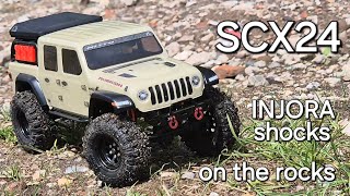 Injora Mountain shocks internal springs on the SCX24 Jeep Gladiator [upl. by Yelrac]