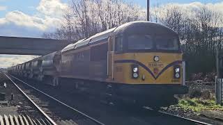 69003 on 6N71 1145 Doncaster Up Decoy to Tyne SS passing SherburninElmet on 30124 [upl. by Nek]