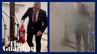 Farright Polish MP extinguishes Hanukkah candles in parliament [upl. by Natek]